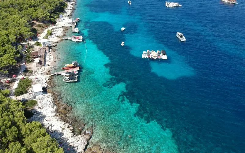 Aerial view of boats in a turquoise bay off Hvar, Croatia