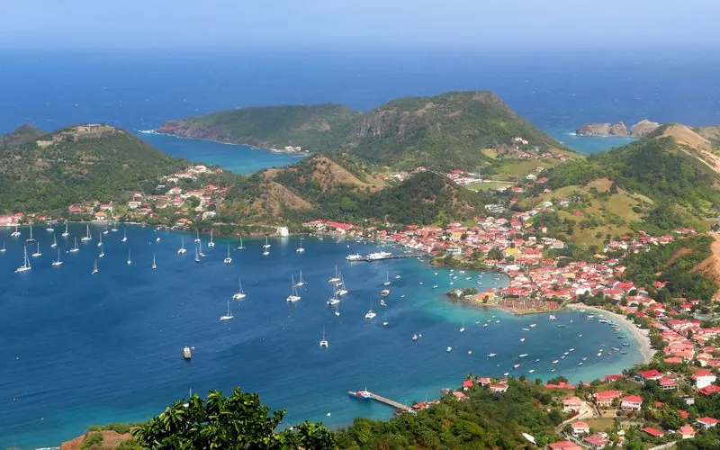 Sailboats anchored in the bay of Terre-de-Haut, Les Saintes